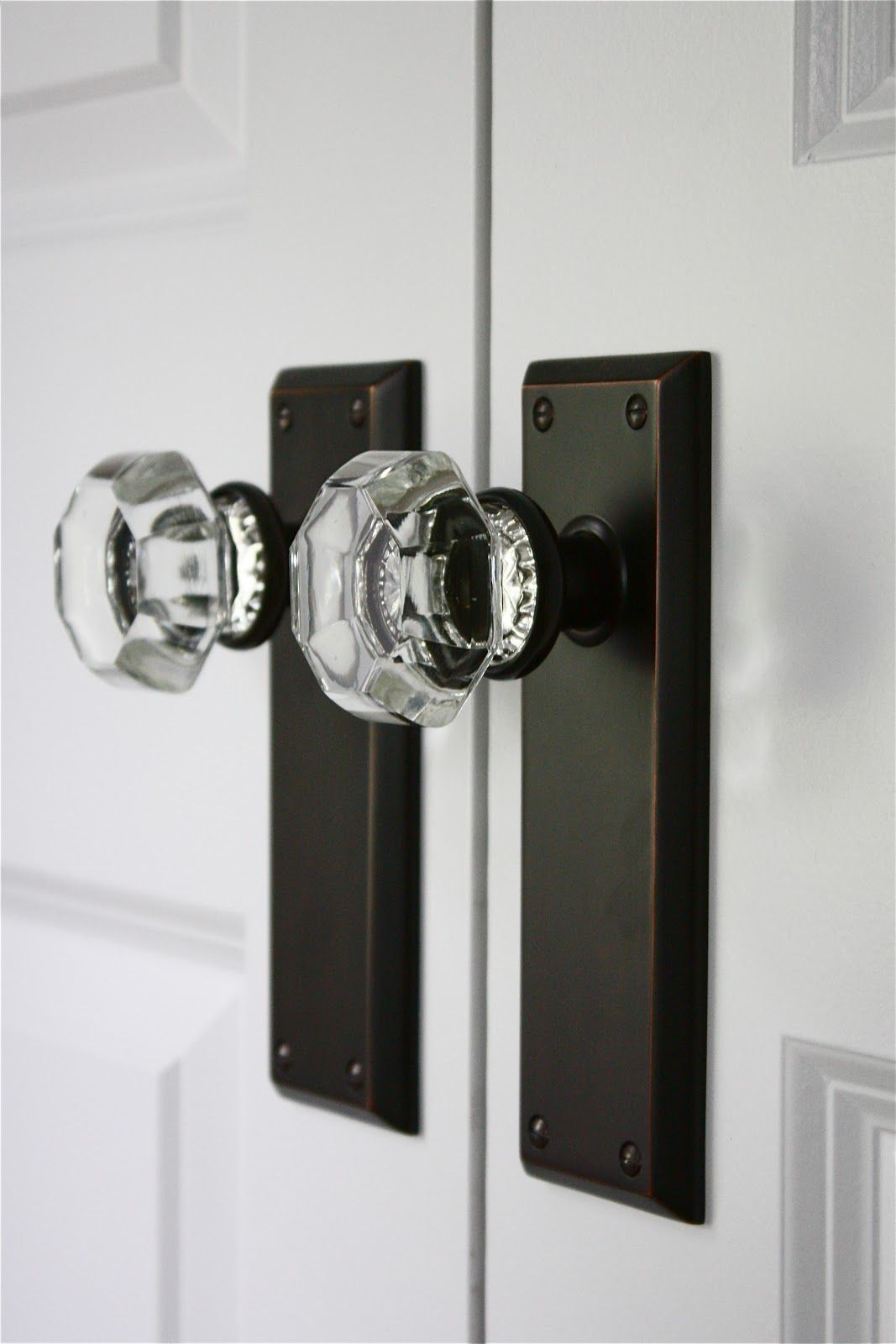 Crystal door knobs on elegant wooden door