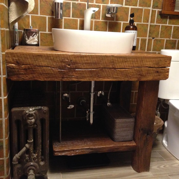 rustic wood bathroom vanity with farmhouse sink