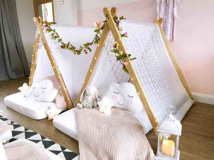 whimsical girls' bedroom with teepee tents