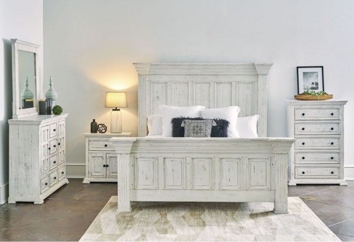 white bedroom set with velvet accents