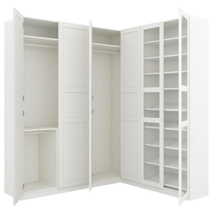 white bedroom set with a corner wardrobe